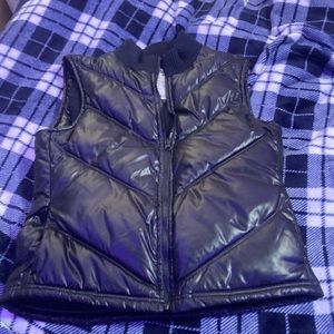 Black puffer zip up sleeveless vest unworn from old navy size small